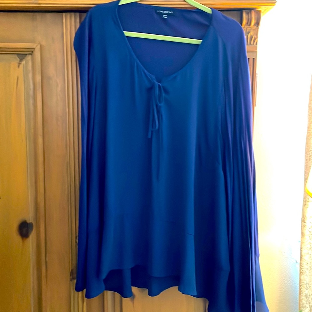 Long sleeve crepe/jersey knit mix  tie front. Navy blue.